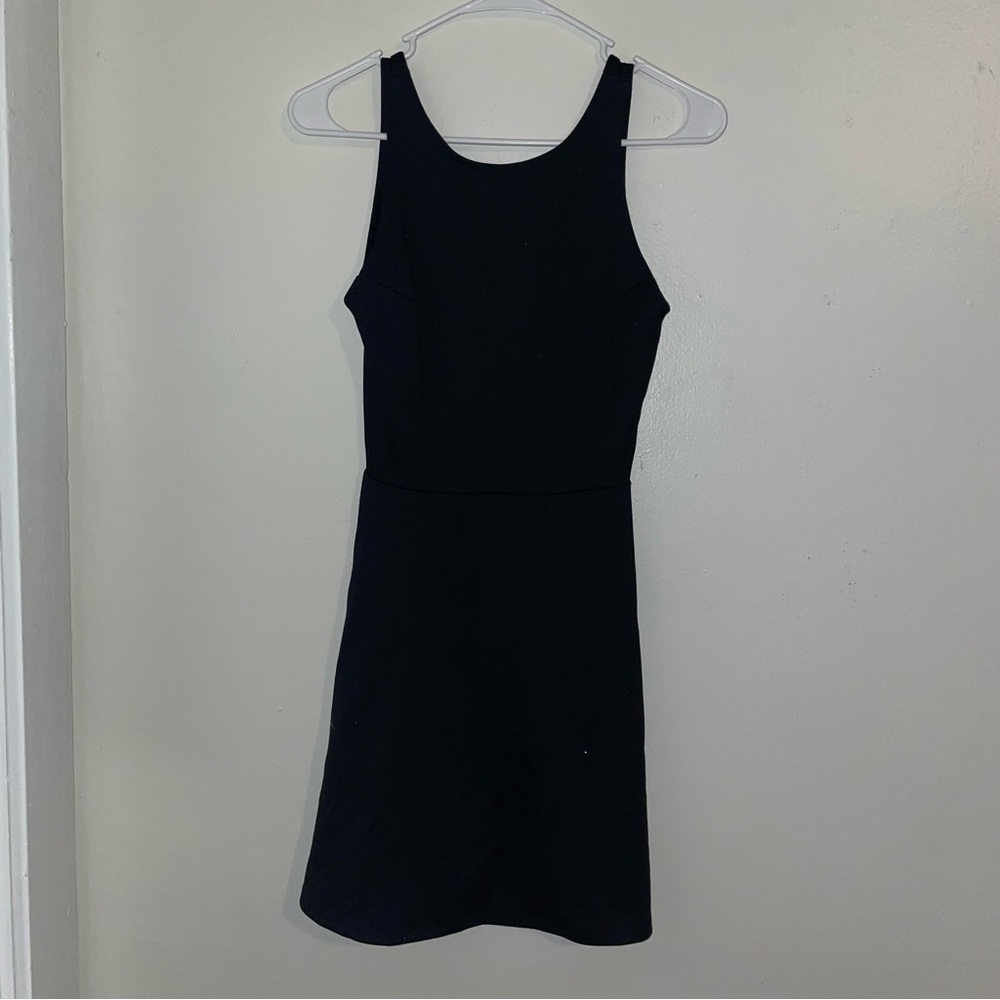 Black H & M skater dress with scoop neck and v-cut back - size 4